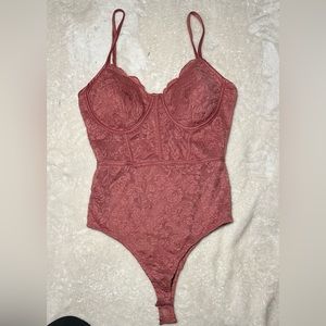 Pink lace bodysuit
